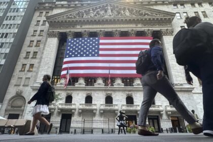 Dow hits record as Wall Street prepares for interest rate cuts